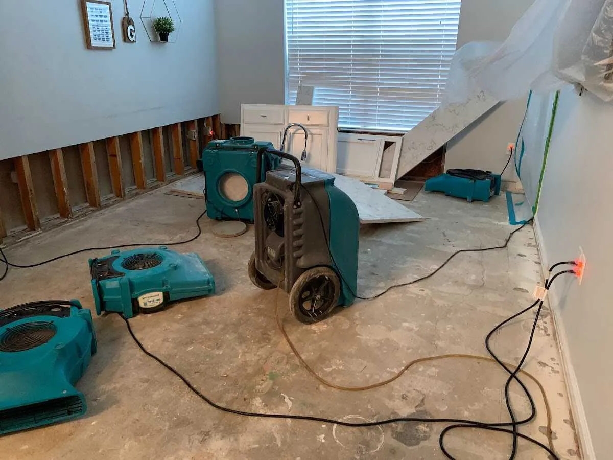 Dehumidifier in flood-cut room for Water Damage Restoration in Valley City